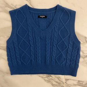 This is a knitted vest dark blue, very soft! I’ve worn once! Great condition!